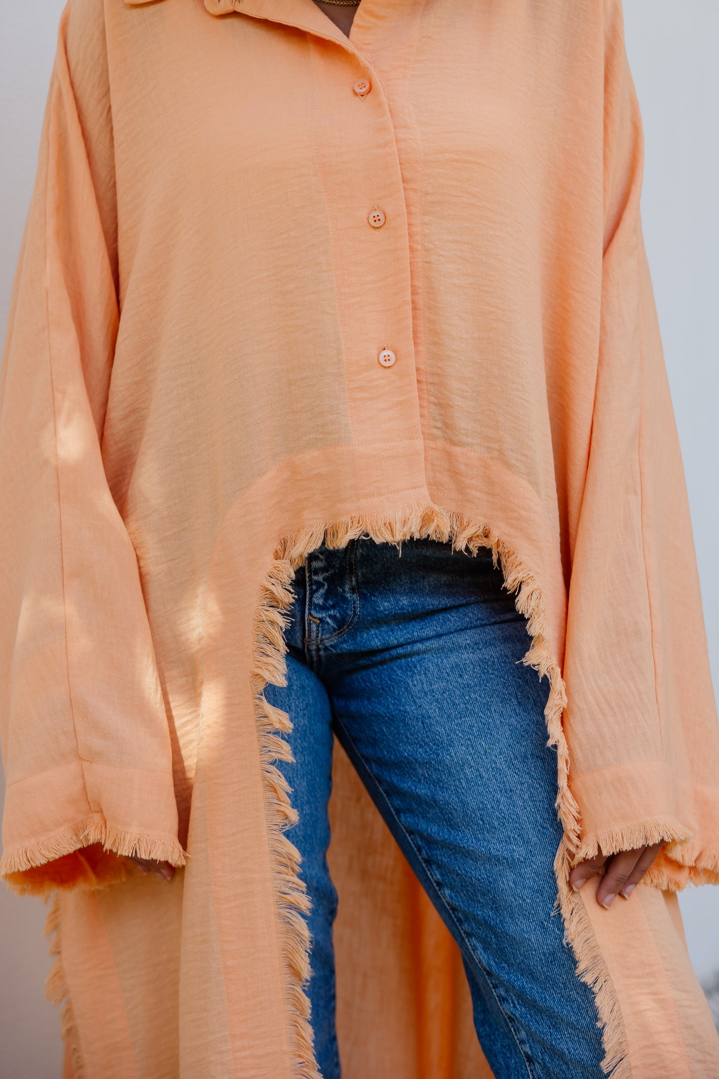 Fringed out cape in Orange