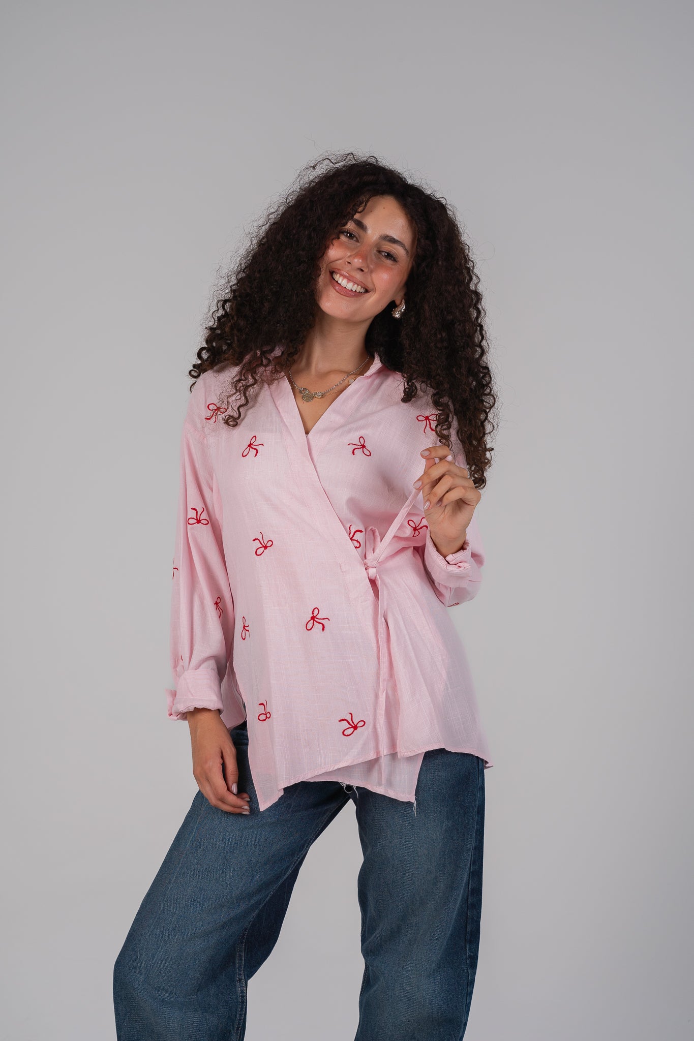 Ribbons embroidered wrap shirt in Pink