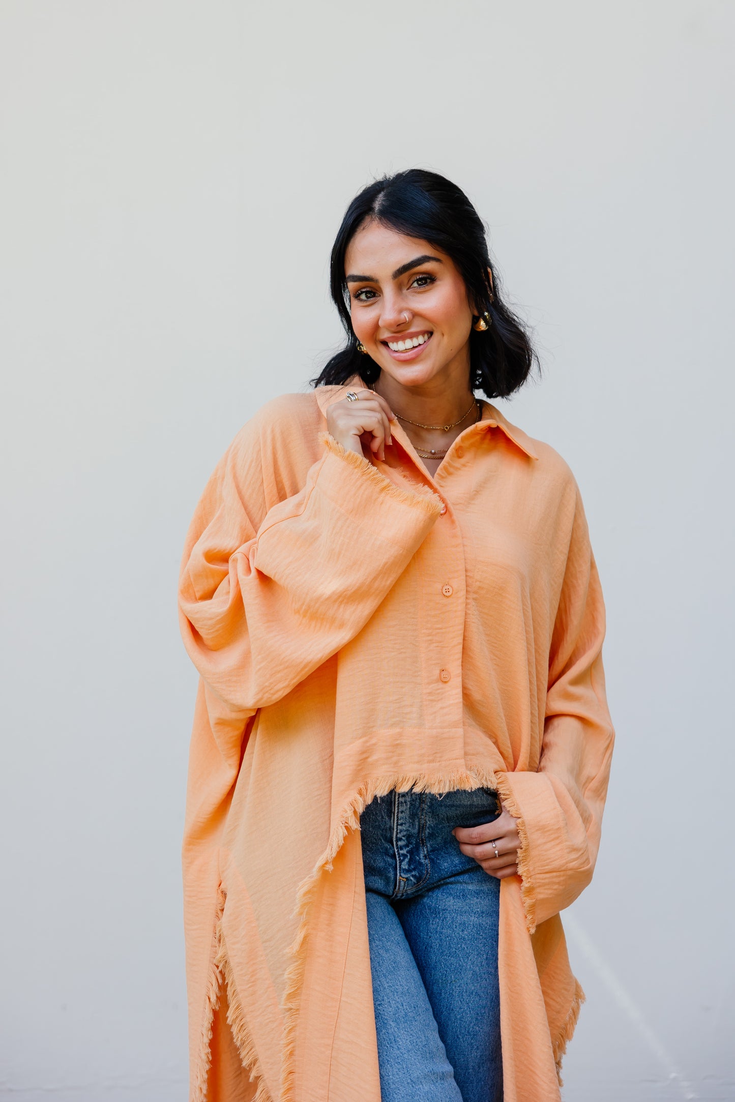 Fringed out cape in Orange