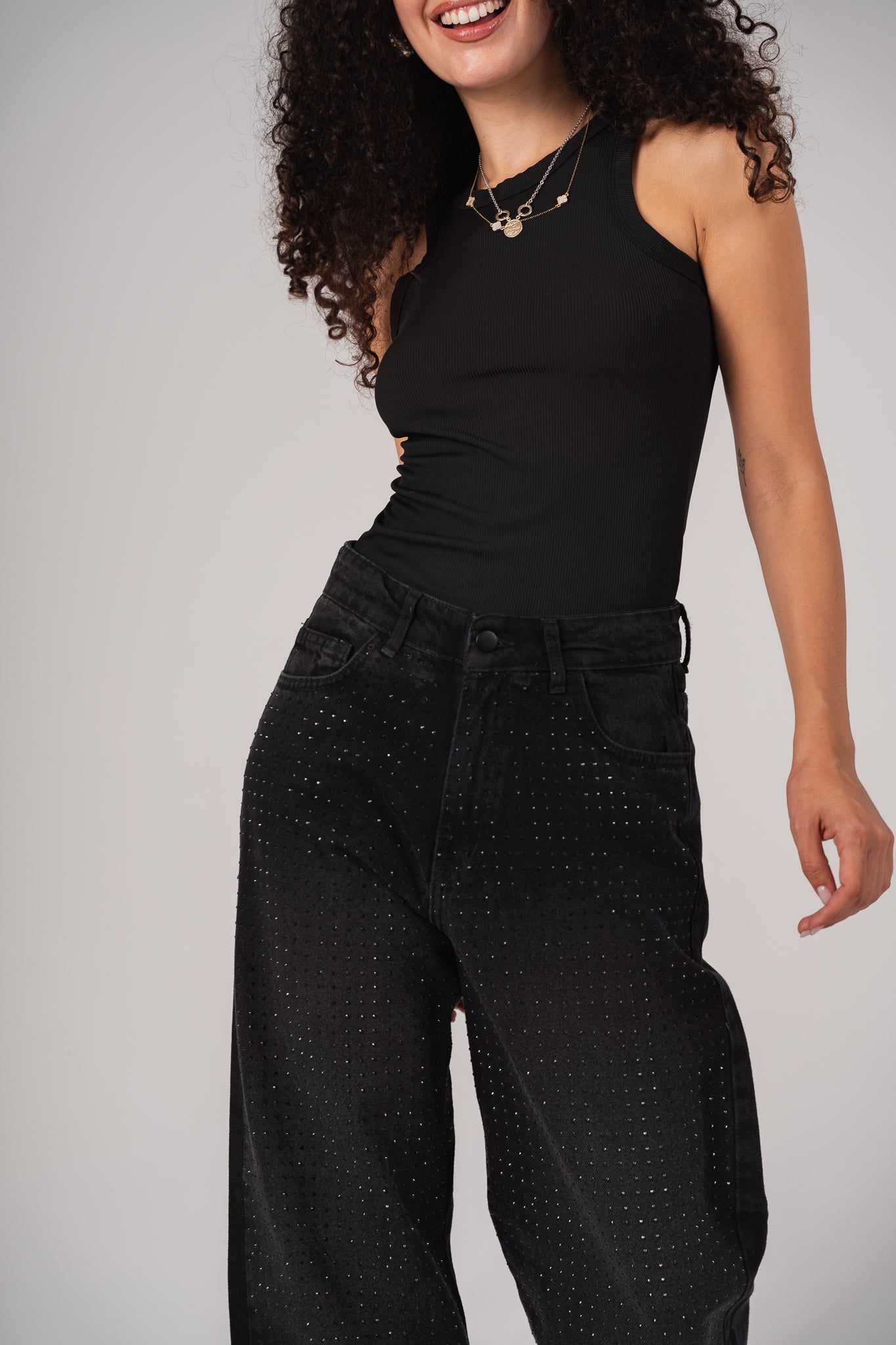 She is studded denim pants