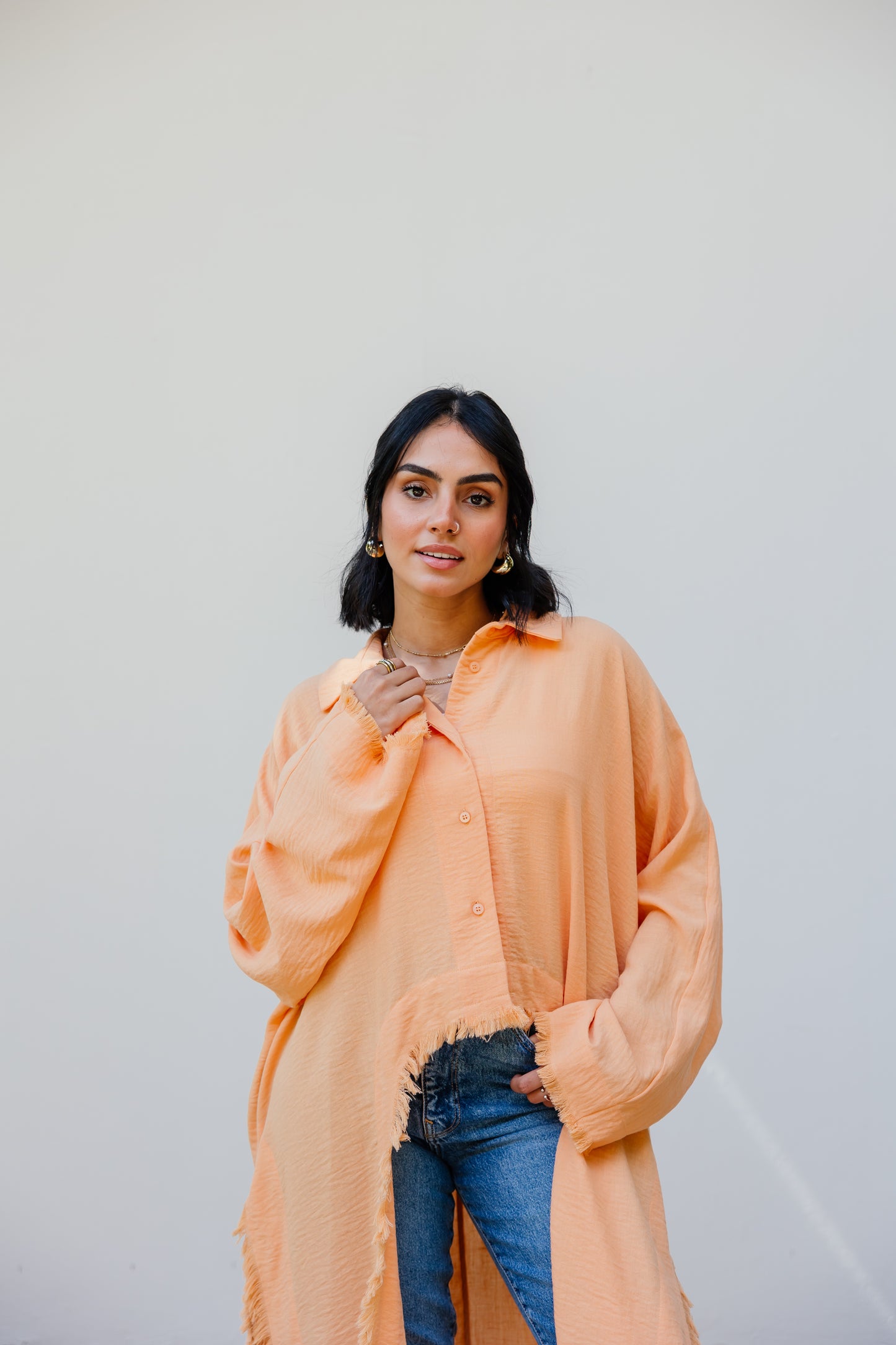 Fringed out cape in Orange