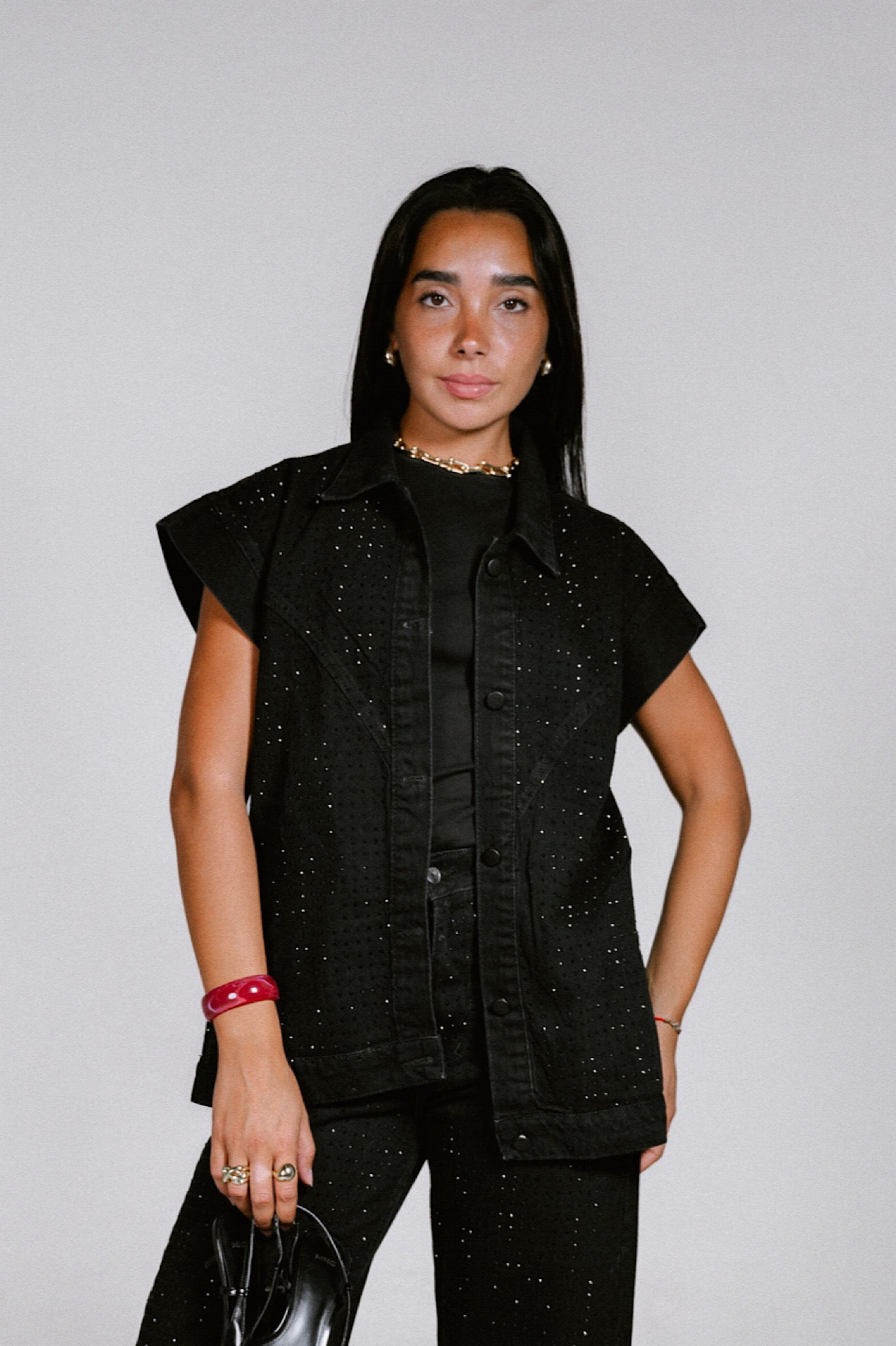 She is studded denim vest in black
