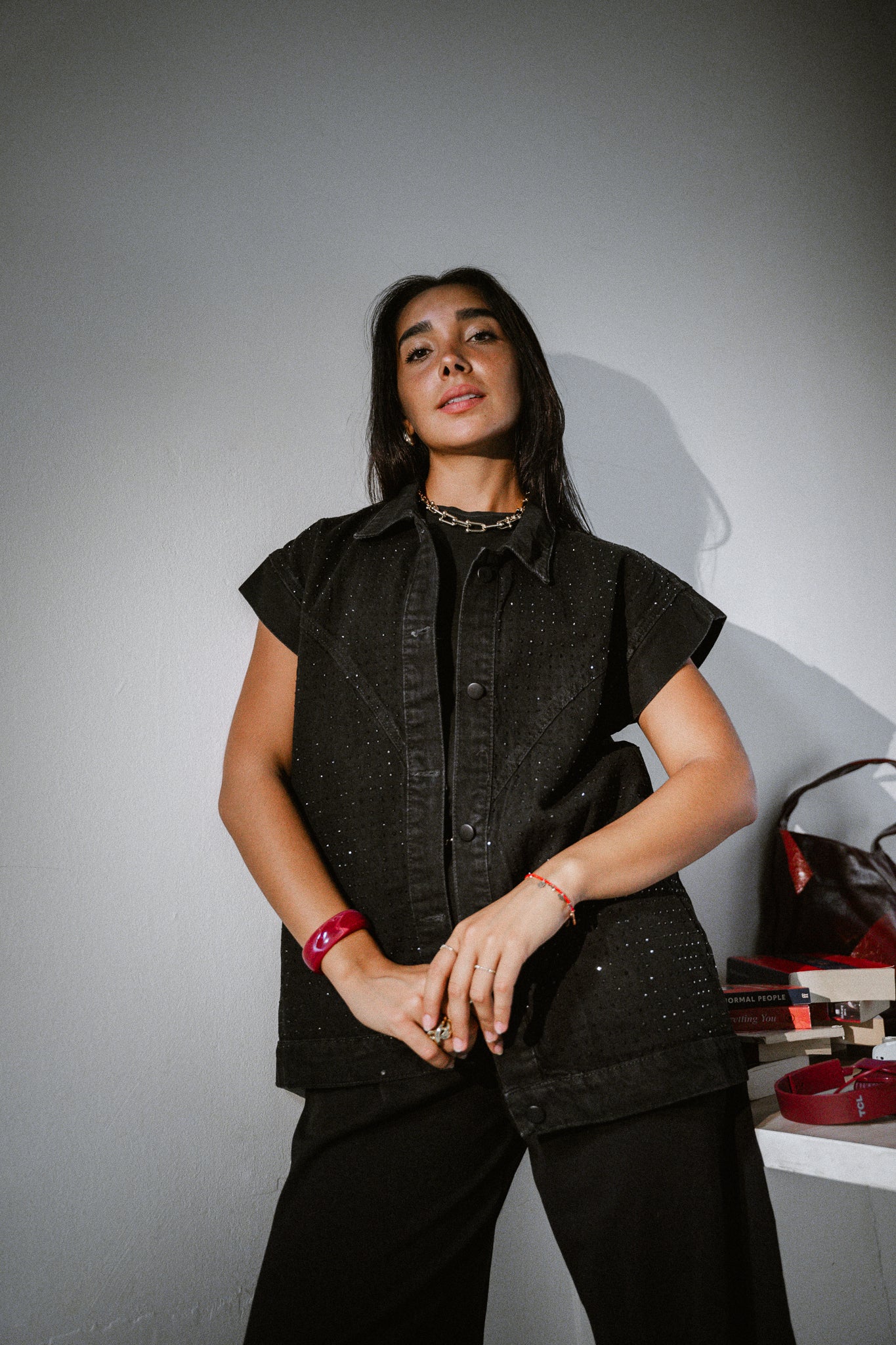 She is studded denim vest in black