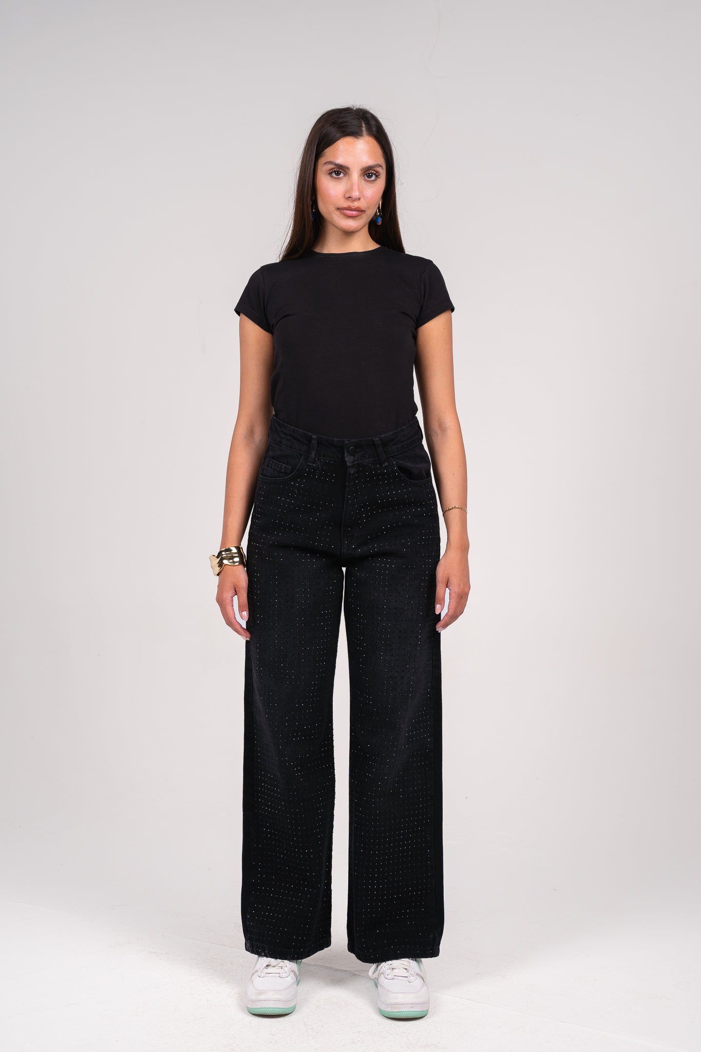 She is studded denim pants