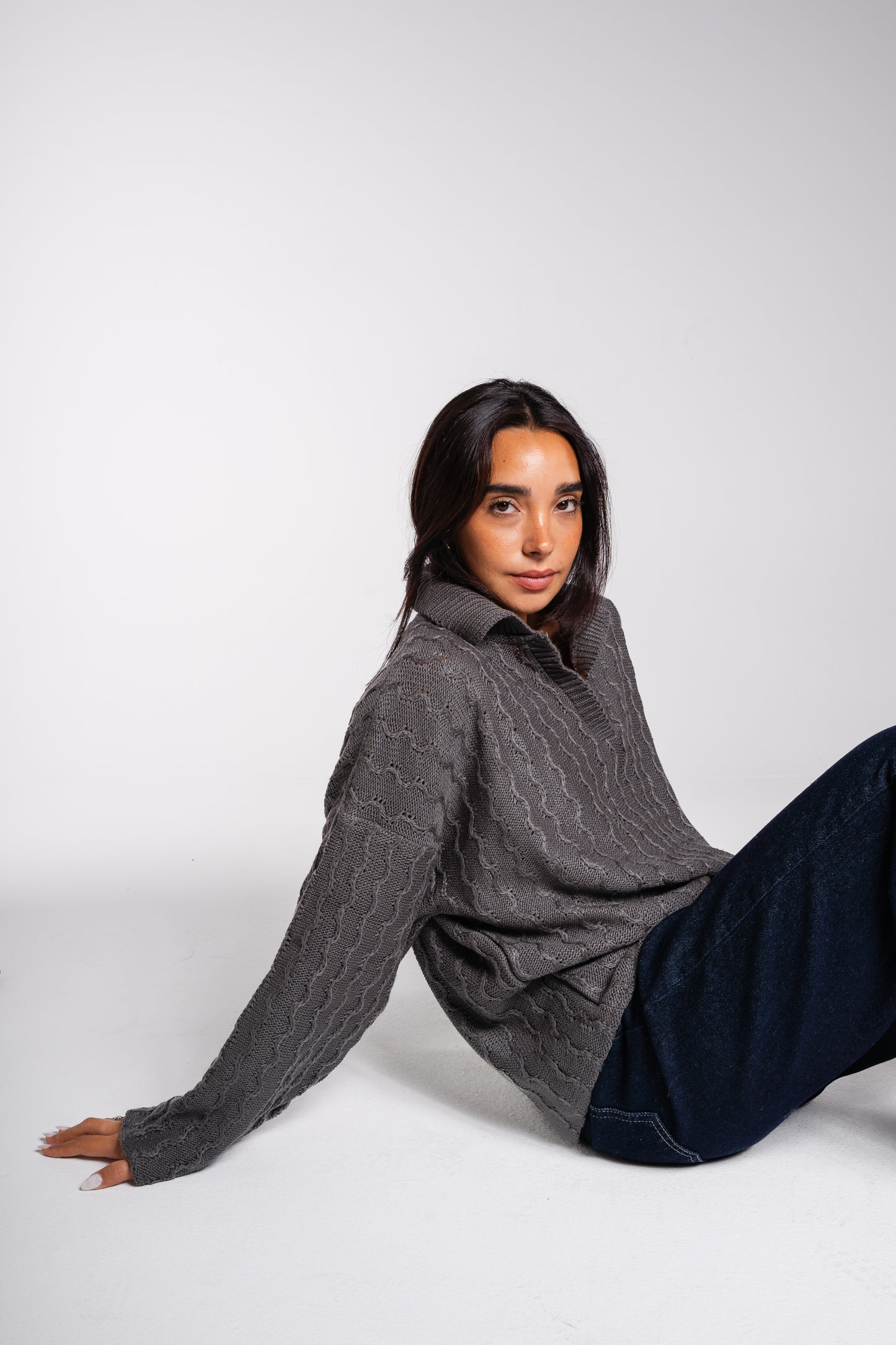 Going Places Pullover In Dark Grey