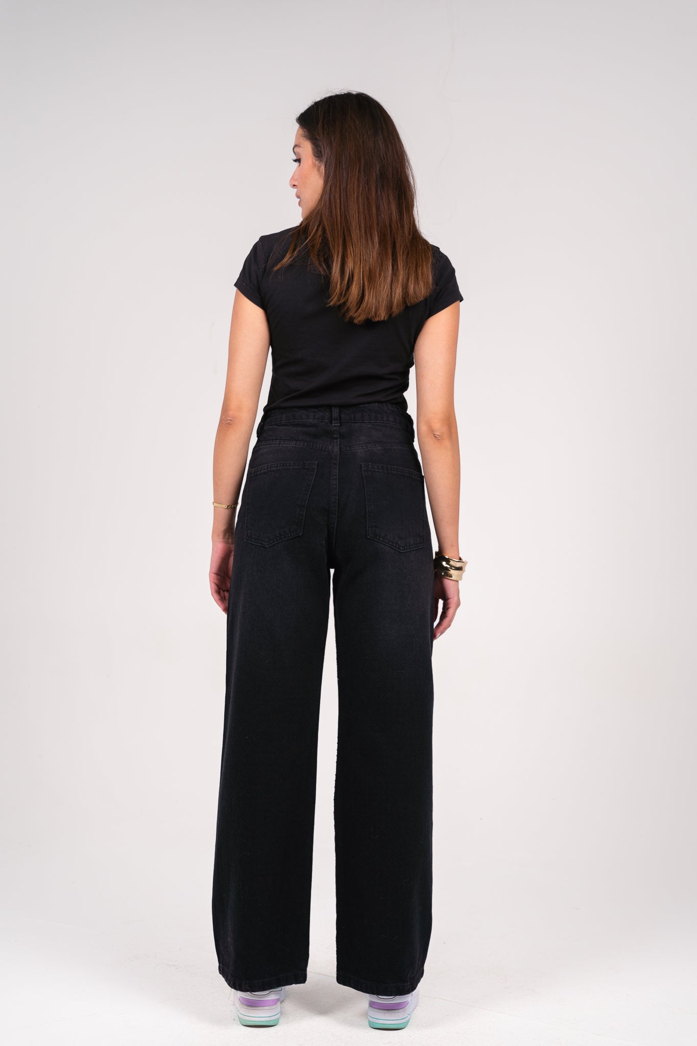 She is studded denim pants