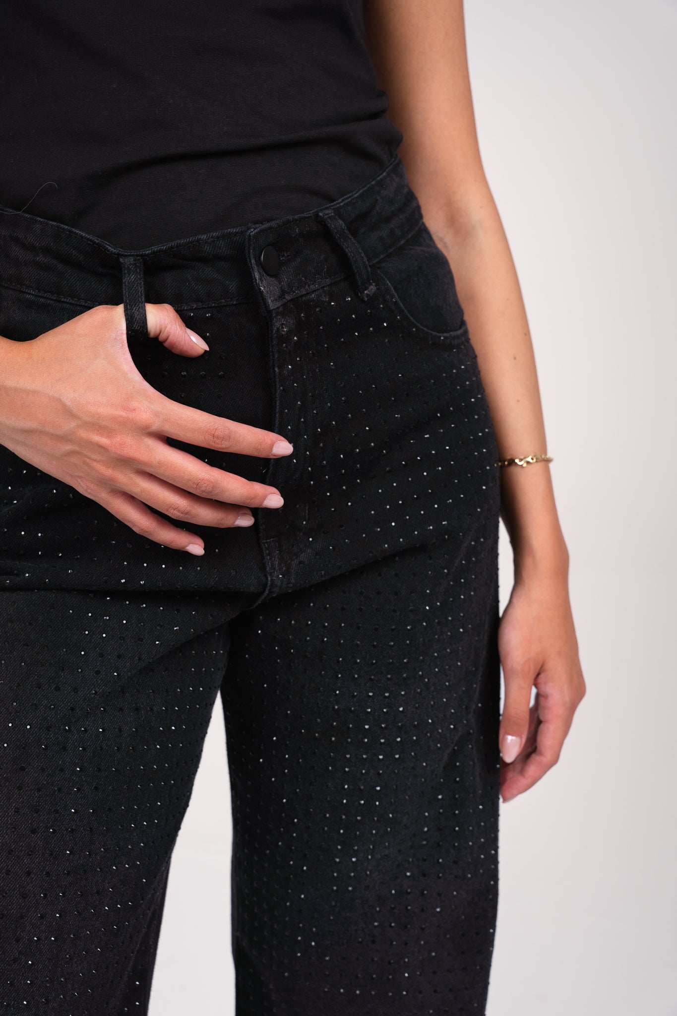 She is studded denim pants
