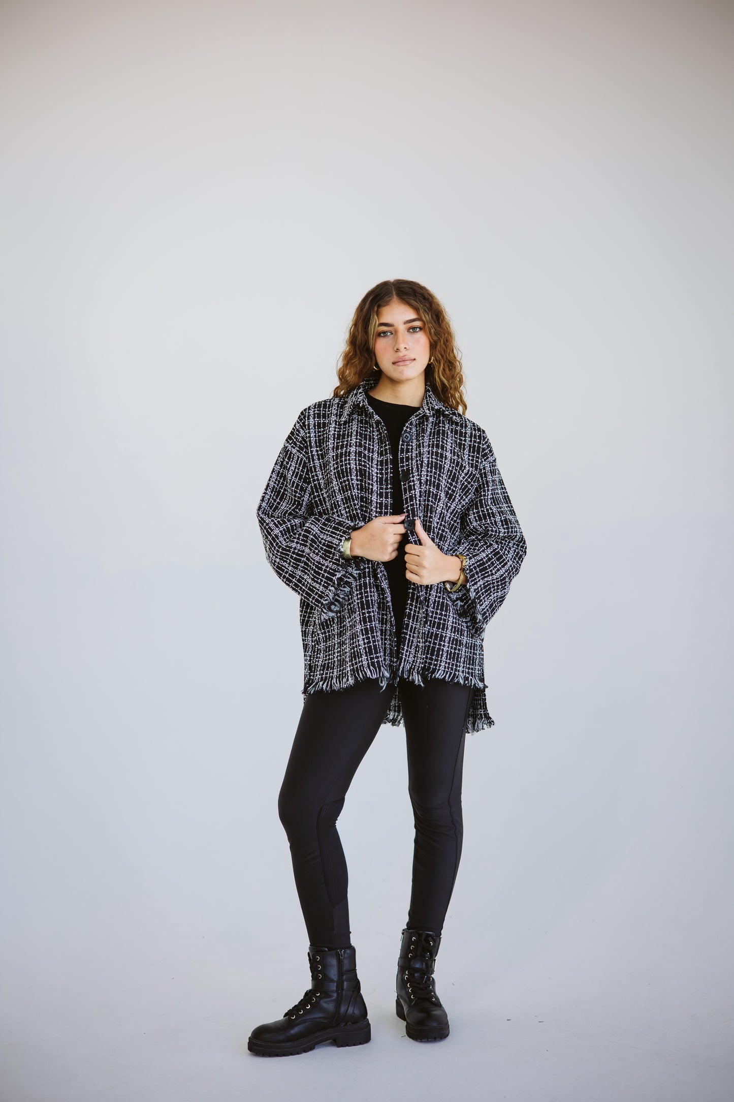 Tweed poncho in black