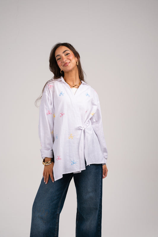 Ribbons embroidered wrap shirt in White