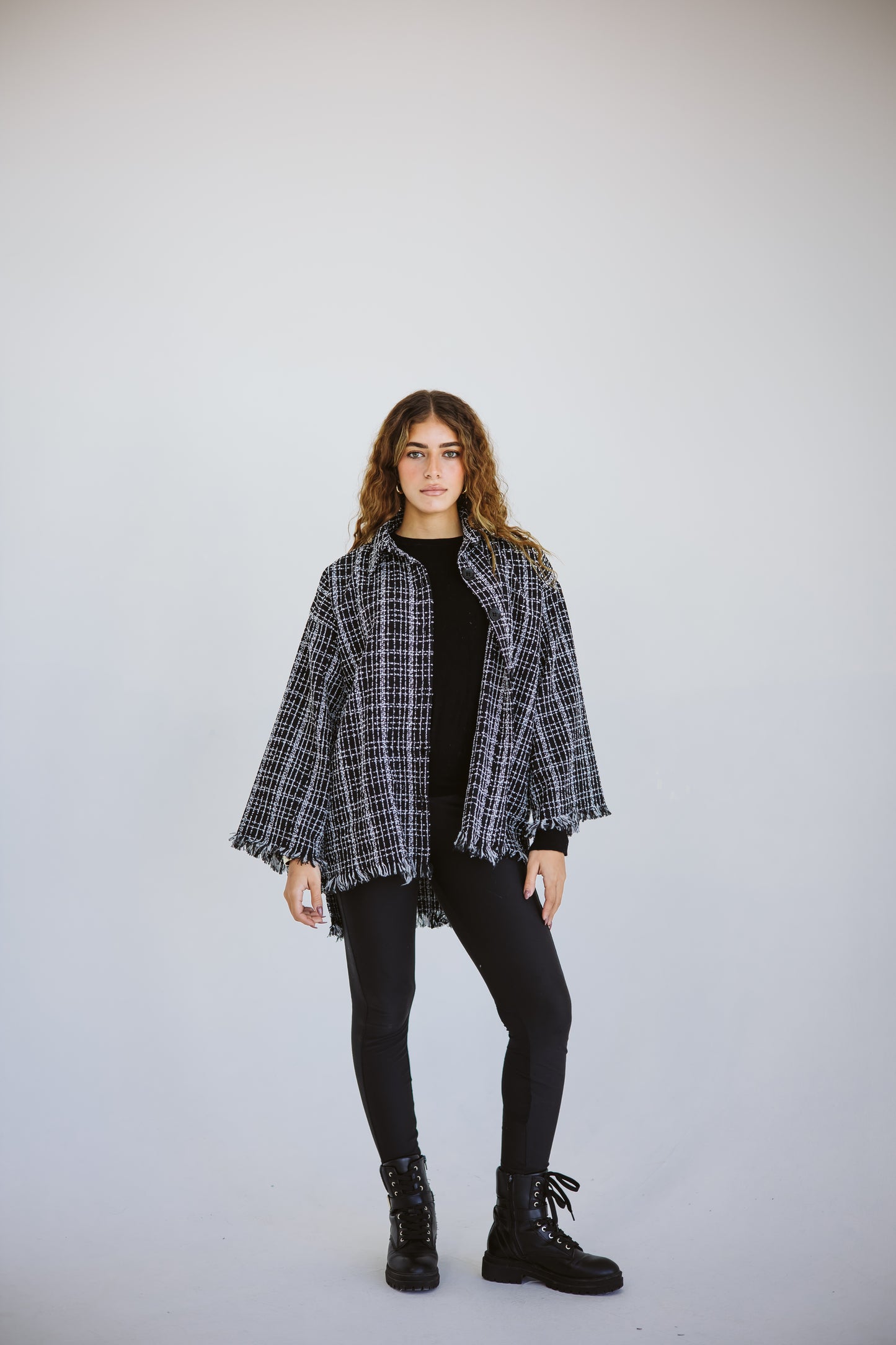 Tweed poncho in black