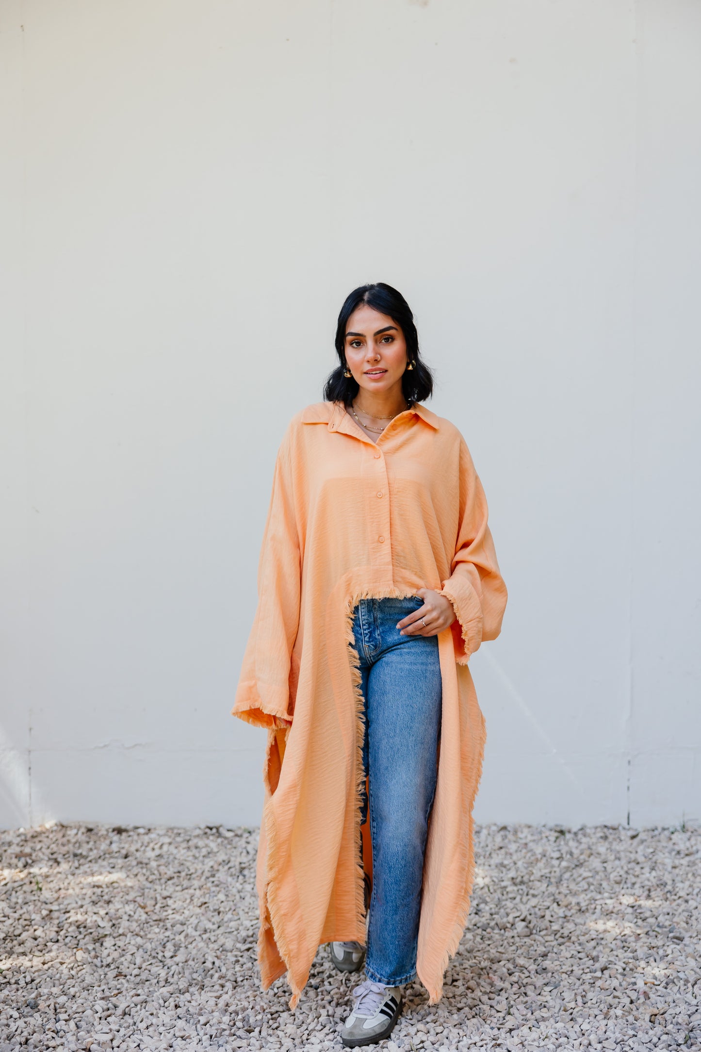 Fringed out cape in Orange