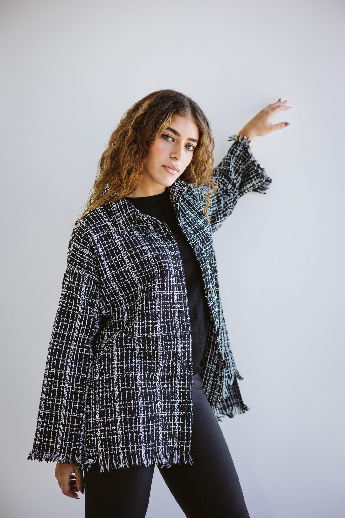 Tweed poncho in black