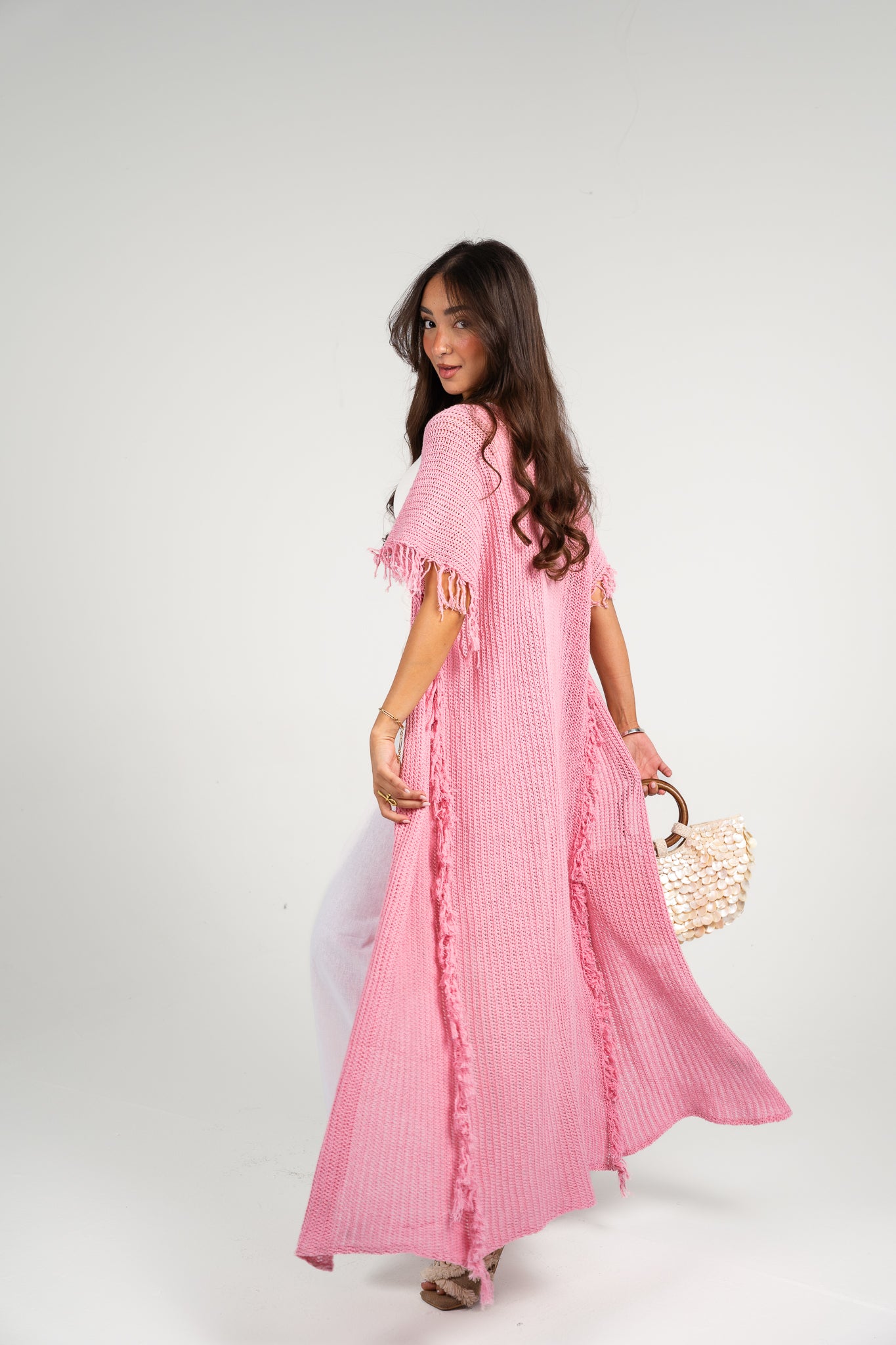 Clear skies crochet cover-up in Pink