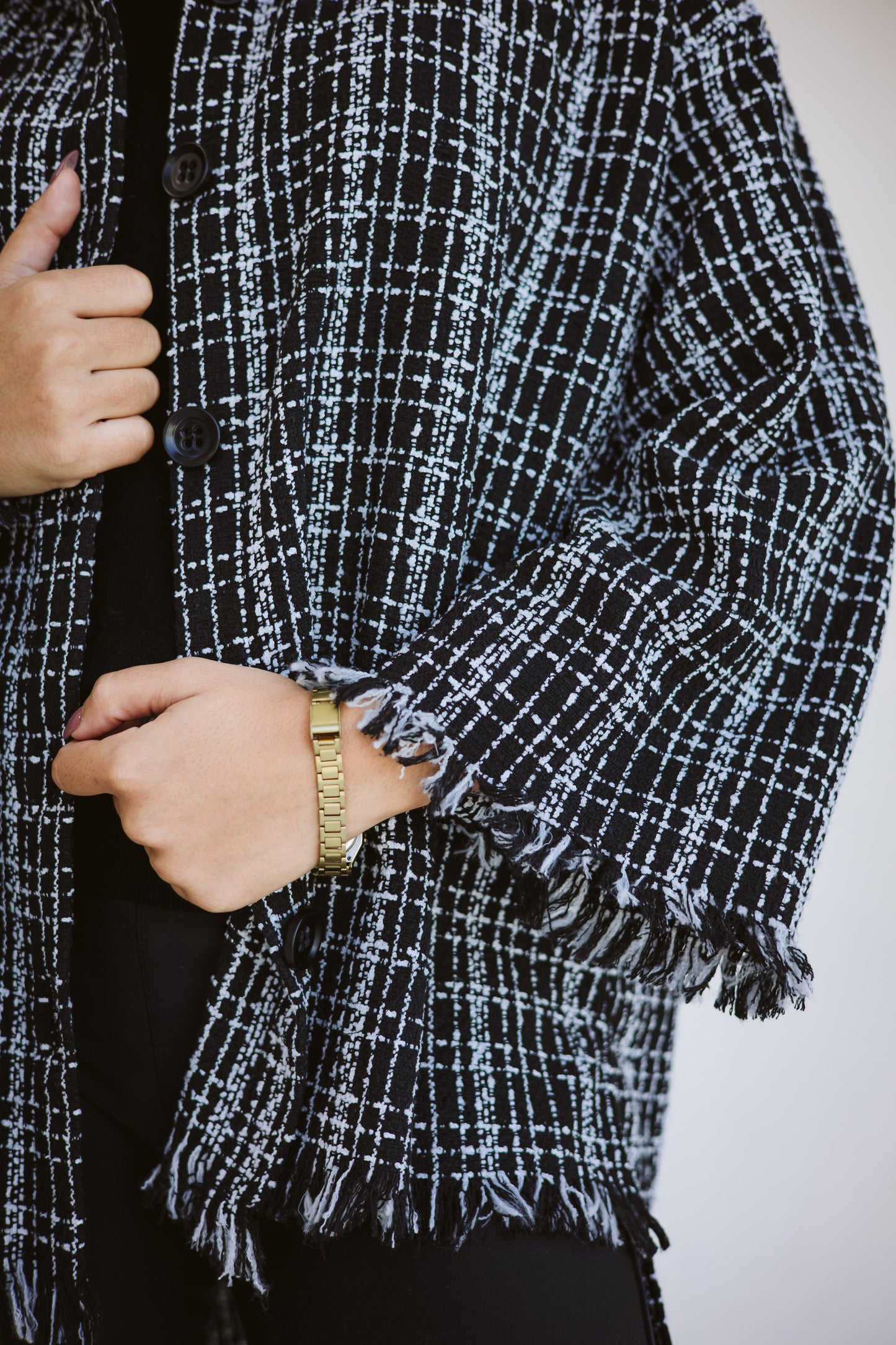 Tweed poncho in black