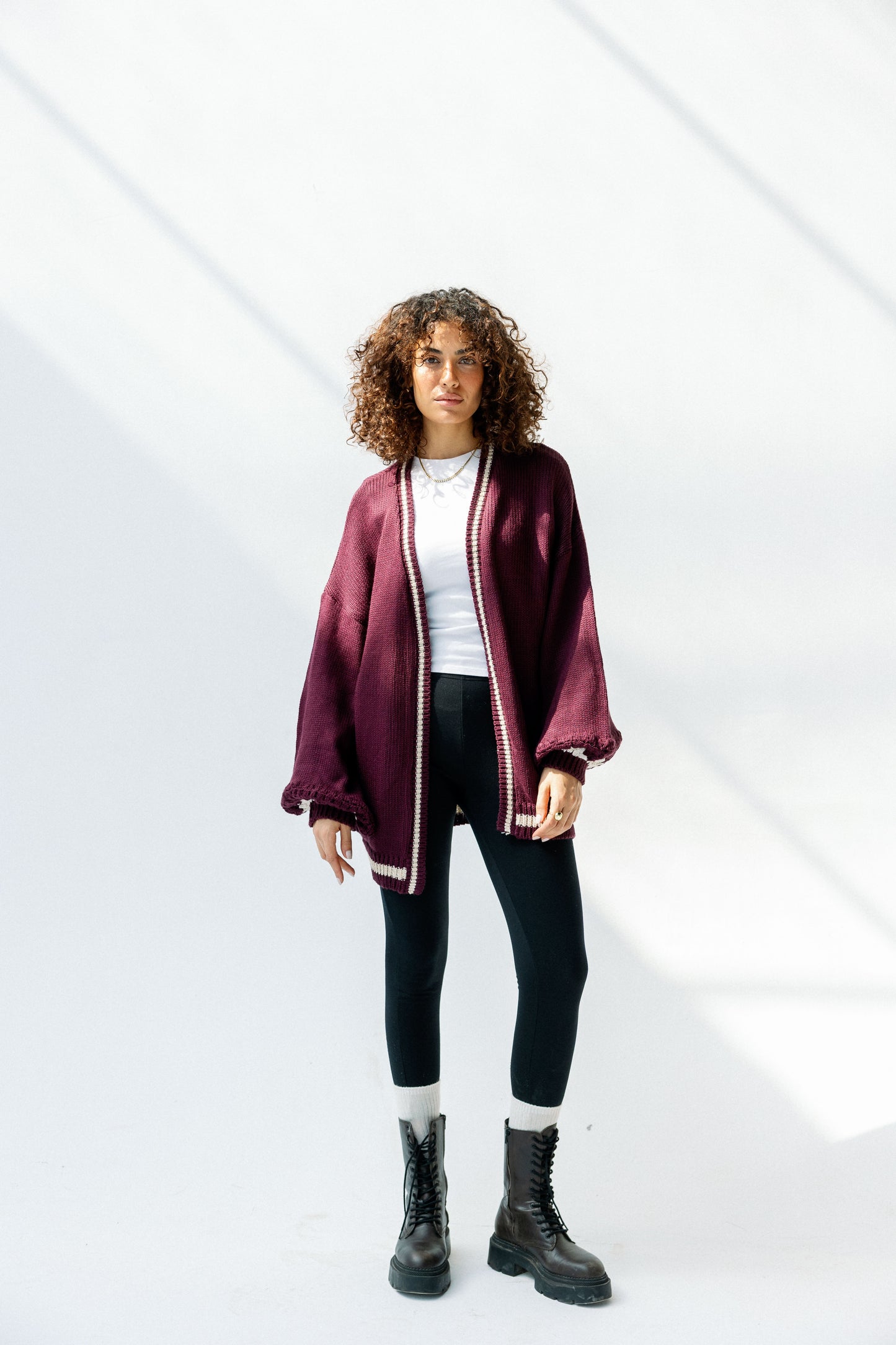 The Aura Cardigan in burgundy