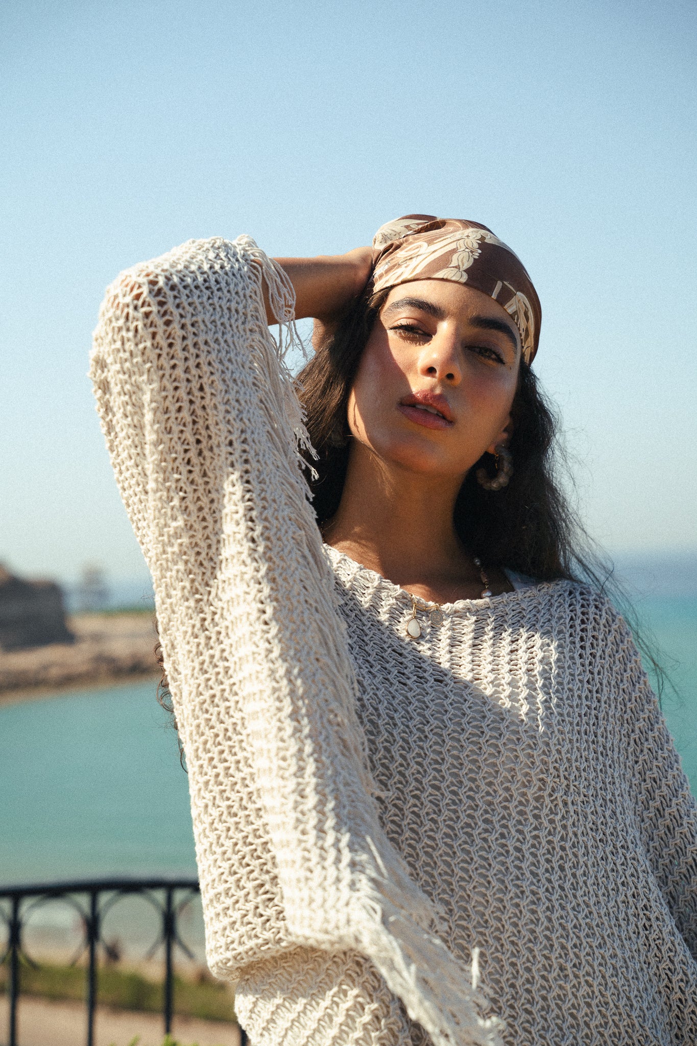 The crochet cape in Off-white