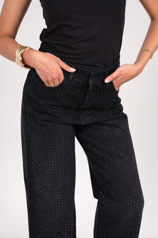 She is studded denim pants